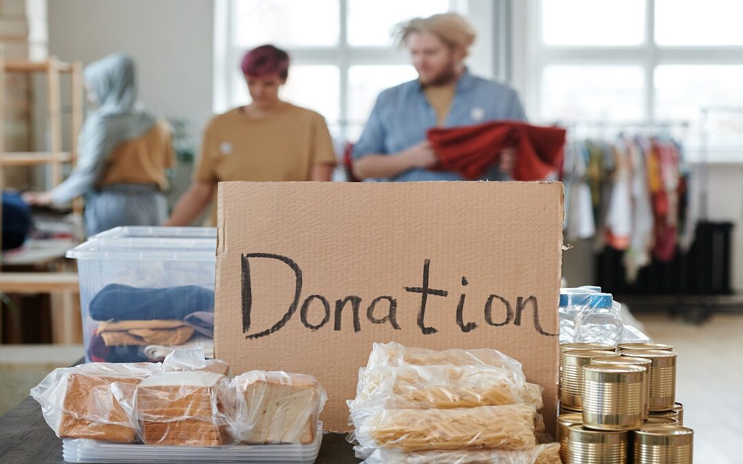Do charities pay tax – a donation box for a UK charity claiming Gift Aid from HMRC