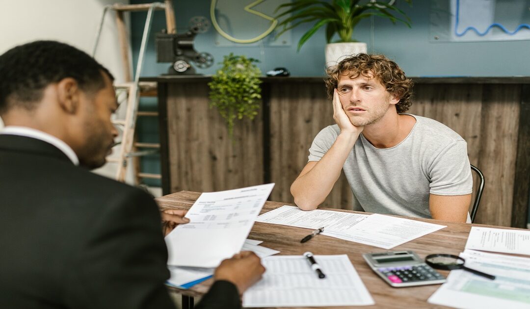 Small business owner signing company incorporation papers, illustrating the private limited company definition